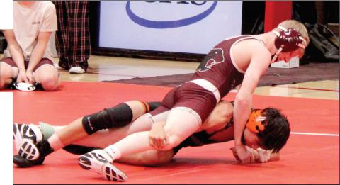 Timber Lake’s Taggen Paxton holds down an opponent while wrestling in the Cheyenne-Eagle Butte-Dupree round-robin meet in C-EB High School last Monday, Feb.2. A sophomore, Paxton earned second place honors in the 120 pound division. Wrestling regionals get underway Friday, Feb. 20, and conclude Saturday, Feb. 21, in Rapid City. Find more sports coverage on Pages 2B-5B Topic Photo/Patty Peacock