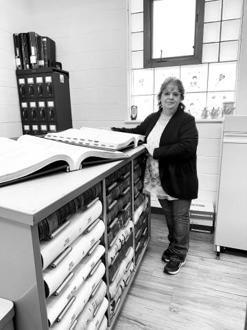 The Dewey County Commission is considering a new space for safekeeping of property records and files in the Register of Deeds office. Cost estimates from HKG Architects range from $109,000 to $265,000 plus architectural fees. Register of Deeds Deborah Goldade (ABOVE) has accumulated about $42,000 for the project from fees paid by users. Photo by Kathy Nelson