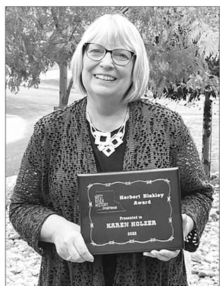 The West River History Conference honored Karen Dahlgren Holzer, formerly of Timber Lake, with the Herb Blakely Award in recognition of her work in local and regional history.