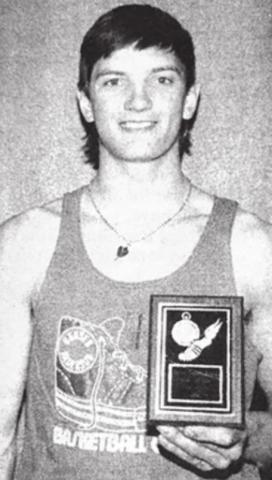 Doug Kraft with the plaque he was awarded when he was named the MVP of the Hoven Legion Relays track meet on April 14.