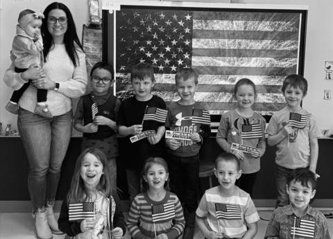 Kindergarten kids learn Pledge of Allegiance