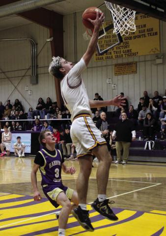 Dupree’s Spencer Olsen scored on a steal and layup during the Tigers’ 7253 win over the Ranchers last week in the Region 8B semifinals. Dupree’s win moved them into the SoDak 16, where the No. 9 seeded Tigers faced No. 8 Sully Buttes on Tuesday, March 10, as this issue of the Topic wa going to press. Topic Photo/Patty Peacock