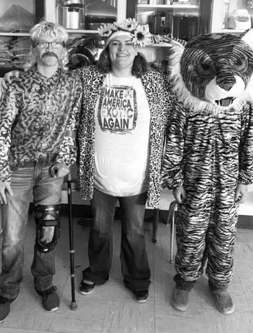 AT RIGHT: The Tiger King (Case DePoy), Carol Baskin (Mrs. Tiffany Pesicka) and their tiger (Alan Lemke).