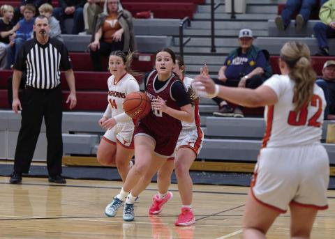 Timber Lake forward Jaylee Schoelerman dribbles past a pair of Faith defenders and looks for a lane to the basket or a teammate she can dish to during the Panthers’ overtime victory over the Longhorns last Tuesday, Jan. 6. Schoelerman played a key role in the win, finishing the game with a team-high 16 points. Timber Lake will host Sully Buttes on Tuesday, Jan. 20 before the LMC Tournament in Lemmon Jan. 23-24. Find more sports on Pages 8-10. Topic photo by Marie DuPreez