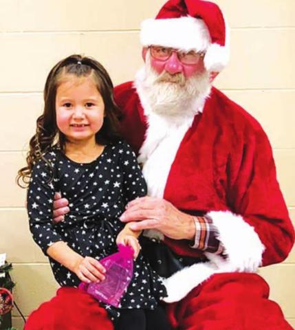 Santa Claus hears wish lists