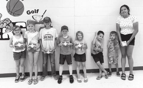 Prize drawing winners who met their AR goal: (L-R) Stella Nilson, Alexa Roggow, Emmett O’Leary, Liam Handeland, Joslyn Goldade, DW Scholtz, Bryson Long, and Kessa Bigger. NOT PICTURED: Barrett Maciejewski and Kamee Mareska