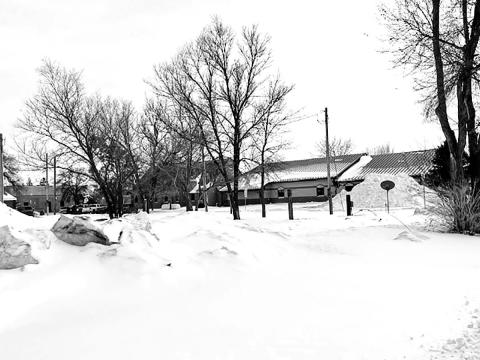 Two snow-covered lots at the corner of Sixth and F Streets (north of Holy Cross Church and the St. Joseph Center) will be the site of the Dakota Plex apartments.