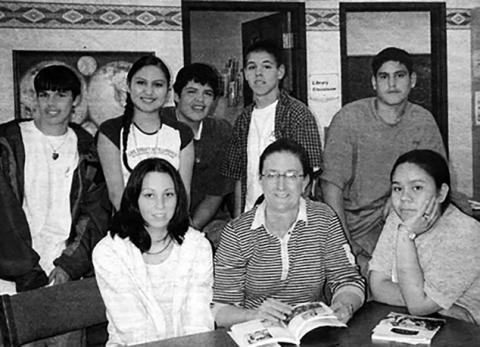Joan Upell with some of the Tiospaye Topa Media Club students. FRONT: Rosemary Marshall, Joan, Marie Yellow Fox; BACK: Tonweya Ducheneaux, Alana Black Bird, Brad Keckler, John Ducheneaux, and Richard (Bubba) Smith. Timber Lake Topic June 12, 2003