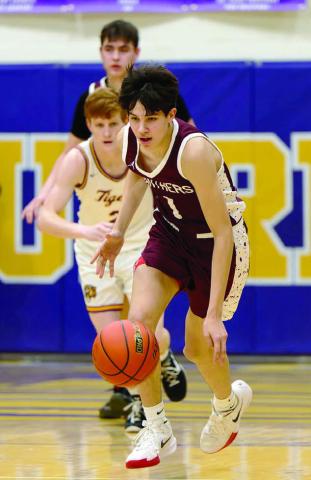 Jackson Bigger pushes the ball upcourt on a Timber Lake fast-break during recent action against Dupree. The Panthers will end their regular season schedule Friday, Feb. 27 at Gettysburg. Topic Photo/Marie DuPreez
