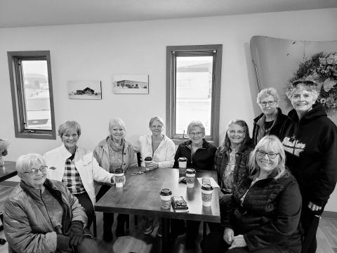 Robin Nannini (FAR RIGHT, FRONT) with the Wednesday morning coffee ladies at Grounded Coffee and Gifts during a visit in October. Others are (L-R) Pat Kjellsen, Audrey Jackson, Barb Gross, Mavis Enright, Janet Gill, Linda Kraft, Jean Tehle, and Kathy Nelson.