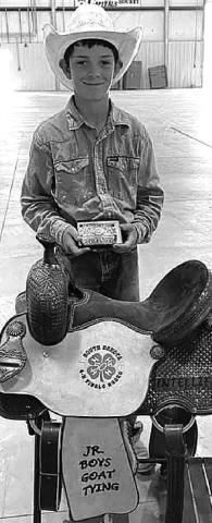 Pete Maher of McLaughlin/ Timber Lake won the State 4-H Championship saddle in junior boys goat tying.