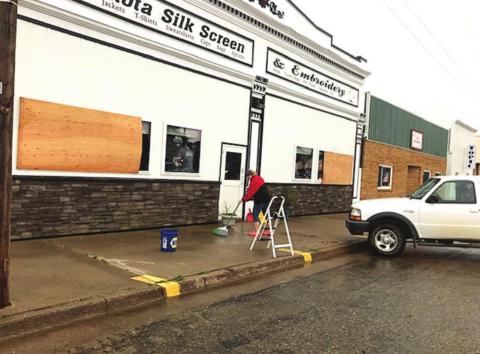 Dakota Silk Screen had just finished a new paint job last week only to be struck by hail that damaged paint and broke windows on Tuesday morning.
