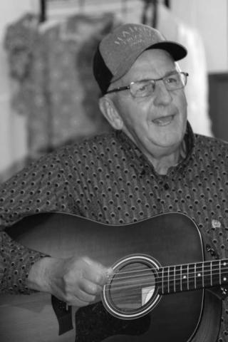 Local singer/songwriter Jon Holmes performed at the annual meeting of the Ziebach County Historical Society.