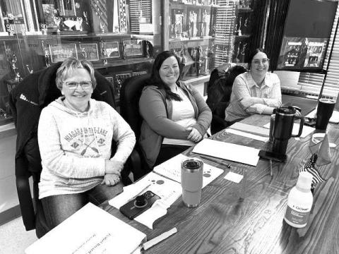Serving as election workers at the Isabel Community Center were (l-r) Heidi Boldt, Marie Du Preez, Lacey Finkbeiner. Incumbent Daryl Pfaff defeated challenger Kyle Boysen for re-election to the Isabel Board of Trustees.