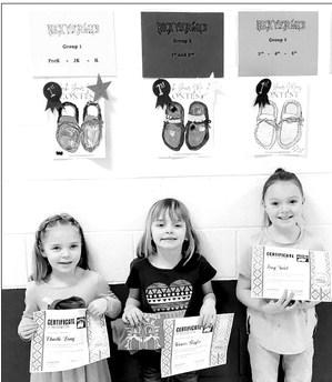 Winners of the elementary division of the Rock Your Mocs coloring contest at Timber Lake School were (l-r) Charly Long, Harper Biegler, and Zoey Spiel.