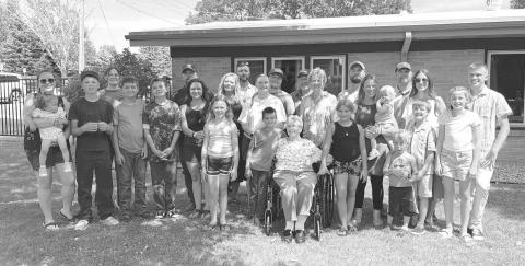 Fauneil Keller celebrated her 90th birthday on July 17. Many of her grandchildren, great-grandchildren, nieces, nephews, and friends came together for an afternoon of visiting, games, and treats at the Walworth County Care Center in Selby. Front (l-r): Remi Schott, Terek, Fauneil, Teagan, Oliver, Conner, and Fiona; Middle: Pam Schott (holding Grace), Albert, Bodee, Korbin, Bridget, Stacy, Jordan Jones, Pat, Brie (holding Alina), Tasha; Back: Bailey, Albert, Perry, Gabe, Joel Aberle, Pierce, Alex, Ian.
