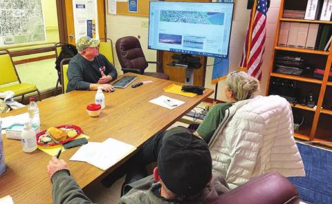 Roger Lawien gives the Timber Lake City Board a peek at the new city website he is helping to build.