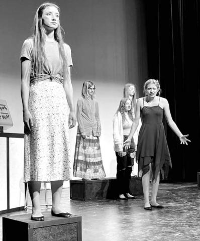 The automated figures begin to come alive. L-R are Natalie Gross, Kendal Lemburg, Maddie Bieber, Averie Marshall and Natalie Biegler.