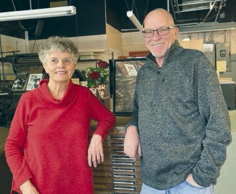Longtime Topic publisher Kathy Nelson with new owner Jon Flatland. Nelson is semi-retiring after 42 years as publisher. Flatland has more than 30 years experience and has been with the Topic as staff writer and sales manager since fall of 2019.