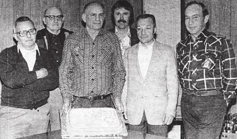 Members of the Gene Gelino American Legion Post were presented with a birthday cake last Tuesday to mark the post’s birthday. The cake, decorated in red, white, and blue, was baked by the Past Presidents of the American Legion Auxiliary and enjoyed by the veterans at their meeting. Pictured above are the Legion officers (L-R) Ken Reed, Dean Fett, Gilbert Elder, Jack Bickel, Andy Aberle, and Jim Hulm. Timber Lake Topic, March 25, 1982
