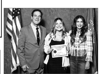 Kenna Webb of Timber Lake High School received a certificate from Gov. Kristi Noem (RIGHT) and Lt. Gov. Larry Rhoden at the Academic Excellence Recognition Luncheon.