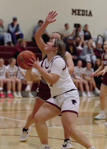Timber Lake forward Kate Biegler eyes the basket on a drive through the lane during regular season action against Newell. The Lady Panthers beat Newell in the quarterfinals of the Region 8B Girls Basketball Tournament last week. Topic Photo/Marie DePreez