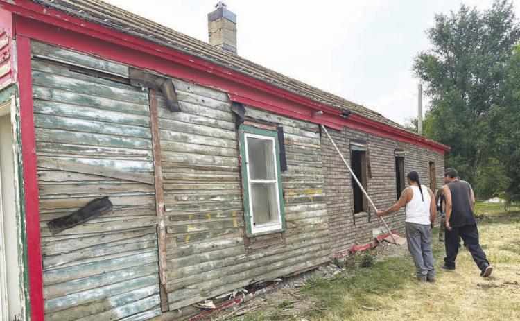 Richard “Bubba” Smith and his crew tore down the former Dewey County Sheriff’s residence - all except the concrete portion that housed the county jail. (See below.)