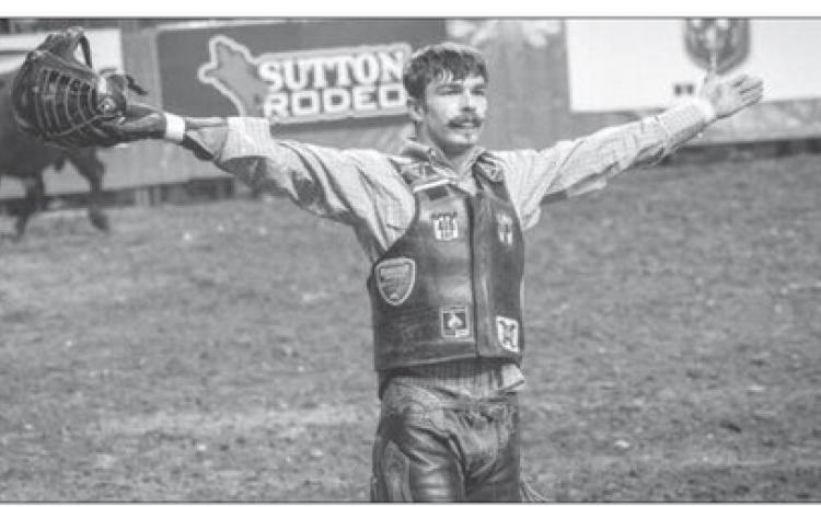 McLaughlin native Chance Schott, 24, acknowledges the crowd after winning the bull riding competition at Rodeo Rapid City last week. Schott also won the Xtreme Bulls event that was part of the Black Hills Stock Show &amp; Rodeo. Photo courtesy of Robert Slocum