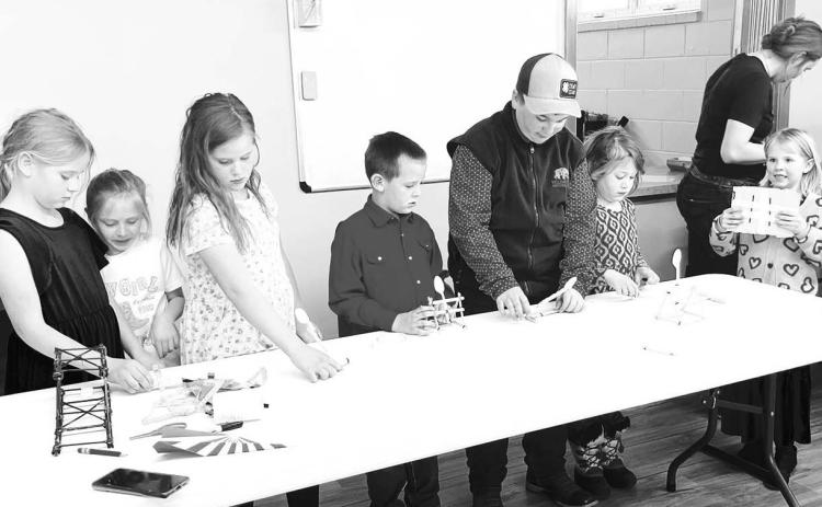 CC science competition where students built bridges and catapults. L-R: Rebecca Hunt, Kimber Clark, Elizabeth Hunt, Jackson Hunt, Caleb Simon, Olive Anderson, and Hannah Hunt.