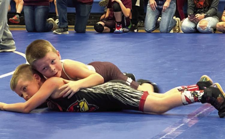 Trevor Aberle, top, of the Timber Lake Youth Wrestling Team, works against an opponent at the Lemmon-McIntosh Youth Wrestling Tournament last Sunday, Feb. 4, in Lemmon. Aberle went 3-0 on the day and captured first place honors in the 5-6 Boys 47-50 B division. Courtesy Photo