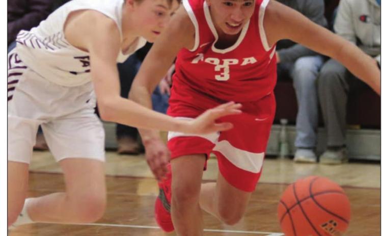 Timber Lake’s Kyler Bollinger (LEFT) and Tiospaye Topa’s AJ Begay race each other to the ball during their Region 8B tournament matchup last week. The Panthers defeated the Hawks to advance. Photo by Jon Flatland