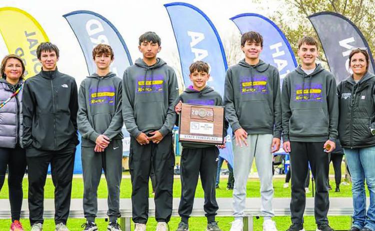 The Dupree Tigers finished third in the State Class B Boys Cross Country race held Saturday in Huron. Team members include (l-r) Coach Jessie Longbrake, Joseph Brewer - alternate, Walker Farlee, Jaden Scott, Rowdy Schrempp, TayShaun Cudmore, Spencer Olsen and Assistant Coach Jazmyn Holmes. Photo courtesy of Kathy Olsen