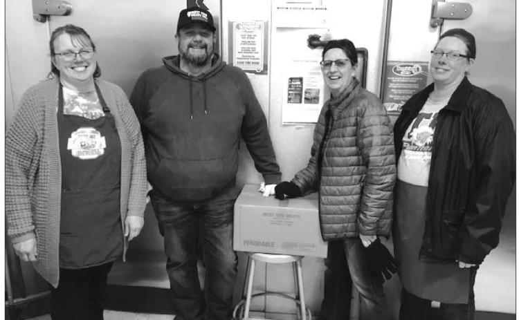 The Timber Lake School kitchen staff received the first shipment of donated beef from the Cheyenne River Farm to School program on March 4. L-R are Diane Goldade, Jayme Murray (irector of the Farm to School Program), Peg Ley, and Robin Hinsz. The beef was donated by Pat and Kasey Maher of Timber Lake.