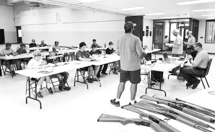 Eighteen students age 11 and older took the HuntSafe class offered by the South Dakota Department of Game, Fish and Parks at Timber Lake on July 10. Completion of the course made them eligible for a youth hunting license at age 12. Above, Jakways Mendoza, a Timber Lake teacher, was one of the instructors, along with Kyle Nilson of Timber Lake and GF&amp;P personnel. Photo by Kathy Nelson