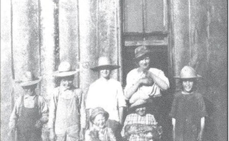 Chapel School about 1920. Front: Bud Caswell and Laura Chapel; Back: Louis Caswell, Ed Caswell, Mac Chapel, Margaret Caswell, and Florence Caswell.