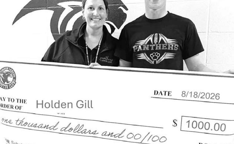 The Timber Lake Booster Club awarded its first-ever scholarship in the amount of $1000 to Holden Gill, a 2026 graduate of Timber Lake High School. The son of Bryan and Kristen Gill, Holden (right) is attending Bismarck State College in Bismarck, ND. Megan Bickel of the Booster Club made the presentation.