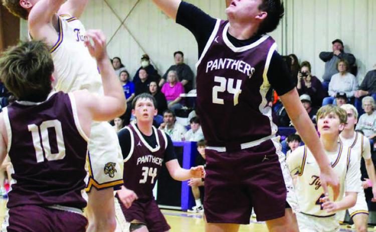 Kanton Hunt (24) harasses Dupree’s Cruz Birkeland as he’s shooting while Treyden Beer (10), Rance Martin (34) look on during recent action. Dupree accounts for two of Timber Lake’s five losses thus far this season. Topic Photo/Marie DuPreez