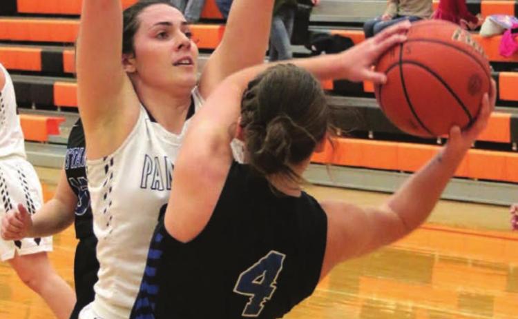 Timber Lake senior Maci Maher’s defense has a South Border player all locked up during their game at the Mobridge Rotary Classic. Photo by Jon Flatland
