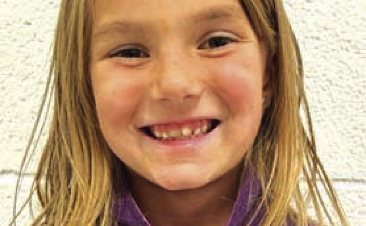 Joslyn Goldade, Grade 2, daughter of Dustin and Kari Goldade “Catch a turkey and get all the feathers off. Then wash it. One thing I know, you have to put stuffing in it and then cook it on 2 or 3 degrees until it beeps to tell you it’s done.”