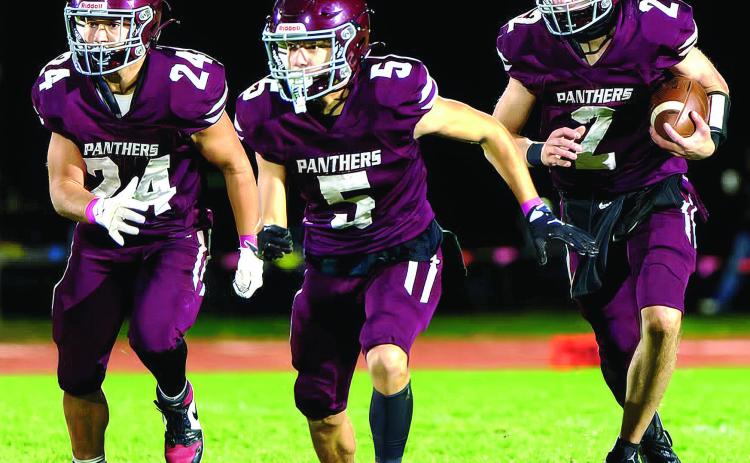Timber Lake HS footballers (LR) Blaise Lei, Rance Gross and Pete Maher helped the Panthers defeat Harding County/Bison 50-8 last Friday, sending TLHS to the playoffs with the #1 seed in 9A. Photo by Marie Du Preez