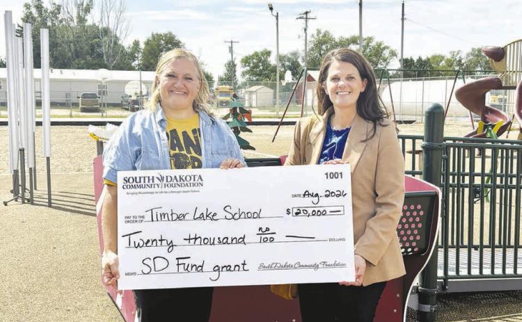 Timber Lake School District was awarded a $20,000 South Dakota Fund grant from South Dakota Community Foundation. Sarah Schweitzer, Timber Lake School District Special Education Director (left) received the check from Jamie Farmen, SDCF Senior Community Development Coordinator (right).
