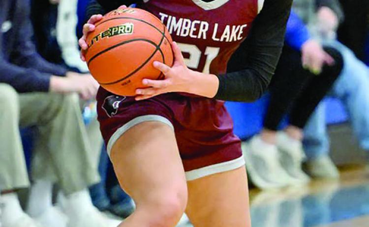 Timber Lake forward Jasmine Nash surveys the floor before running the Lady Panthers offense during recent girls basketball action. Nash, a senior, dropped a team-high 16 points to lift Timber Lake past Herreid– Selby before the holiday break and improve to 2-2 overall. Topic photo by Marie Du Preez