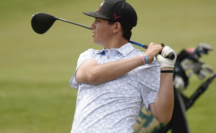 Timber Lake’s Hadley Thompson follows a shot at the South Dakota Class B Golf Tournament in Rapid City last week. He finished 20th overall and his brother, Hayden, placed 25th. Photo by Ryan Deal, 605 Sports