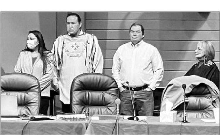 Cheyenne River Sioux Tribe officials sworn in by Chief Judge Brenda Claymore (RIGHT) at the inauguration ceremony are (L-R) EvAnn White Feather (secretary), Ryman LeBeau (chairman) and Kevin Keckler (treasurer). Courtesy photo