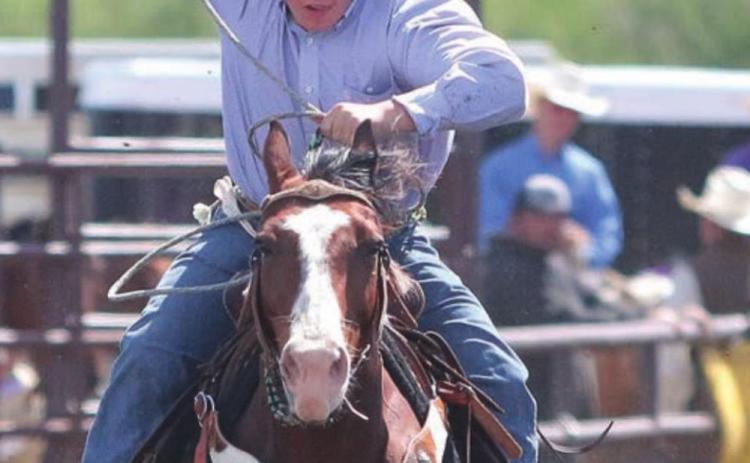 Brady Maher chases down a calf while roping in the Dewey County 4-H rodeo Sunday. Photo by Jon Flatland