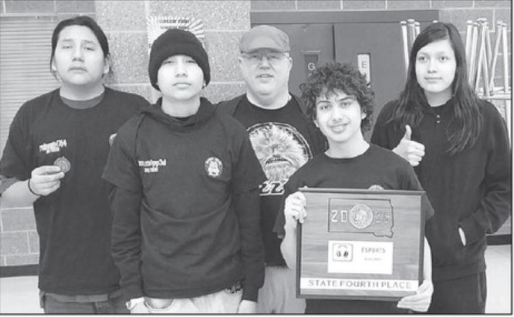Dupree Esports team, l-r: Caye Waloke, Brandon Oakie, Coach Joseph Gould, Isaiah Pesicka, and Luka Schlecht.