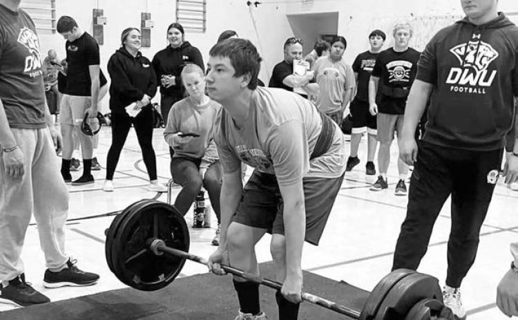 Rio De La Rosa, a junior at Dupree High School, holds a fourth place lift in the 181.75 pound division at the Mitchell Powerlifting Meet on Saturday, Dec. 7.