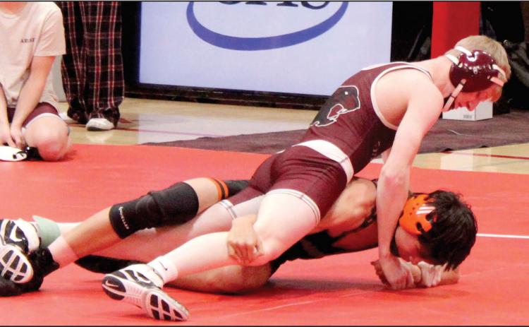 Timber Lake’s Taggen Paxton holds down an opponent while wrestling in the Cheyenne-Eagle Butte-Dupree round-robin meet in C-EB High School last Monday, Feb.2. A sophomore, Paxton earned second place honors in the 120 pound division. Wrestling regionals get underway Friday, Feb. 20, and conclude Saturday, Feb. 21, in Rapid City. Find more sports coverage on Pages 2B-5B Topic Photo/Patty Peacock