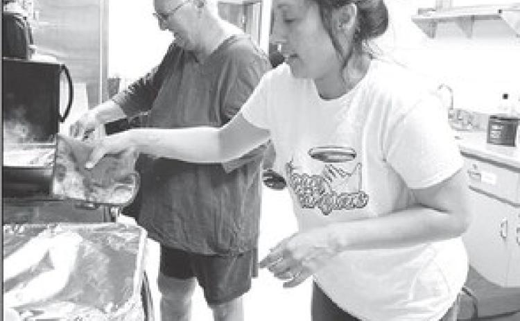 Gina Simon, right, is the new head cook for the Timber Lake-Isabel Senior Meals Program and will also serve as meals site co-manager with Margaret Holloman, left. The meal site moved to the Timber Lake Community Center from Isabel last week. Photo by Kathy Nelson