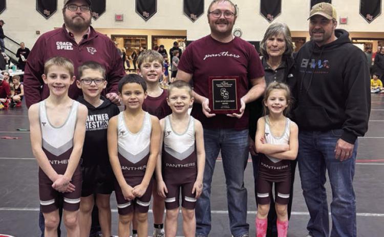 The Timber Lake Youth Wrestling Team was presented the Don Vorhees Sportsmanship Award at the Brandon Delzer Memorial Wrestling Tournament held Saturday, Jan. 11, in Sturgis. Team members are (l-r) Crawford Maher, Lincoln Aberle, Wilson Wiedmer, Vern Long (middle) Trevor Aberle and Rowan Maher; (back) Coaches Travis Spiel and Sawyer Sandquist along with members of the Vorhees family.